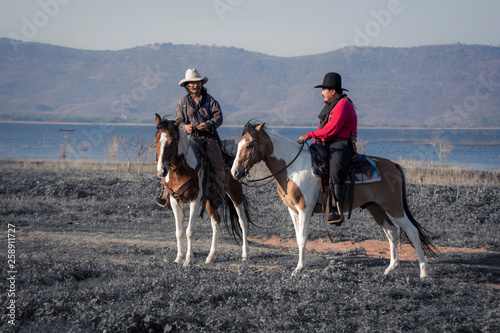 Cowboy on horseback.Cowboy riding horse.