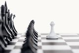 selective focus of chessboard with black chess figures and white pawn in front isolated on white
