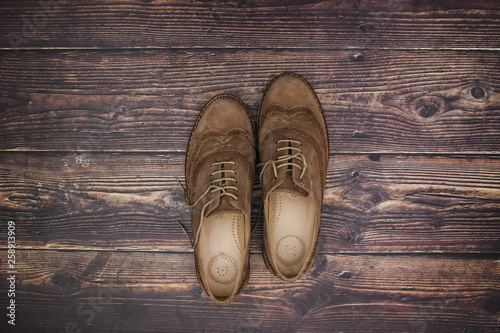 Woman shoes on wooden background
