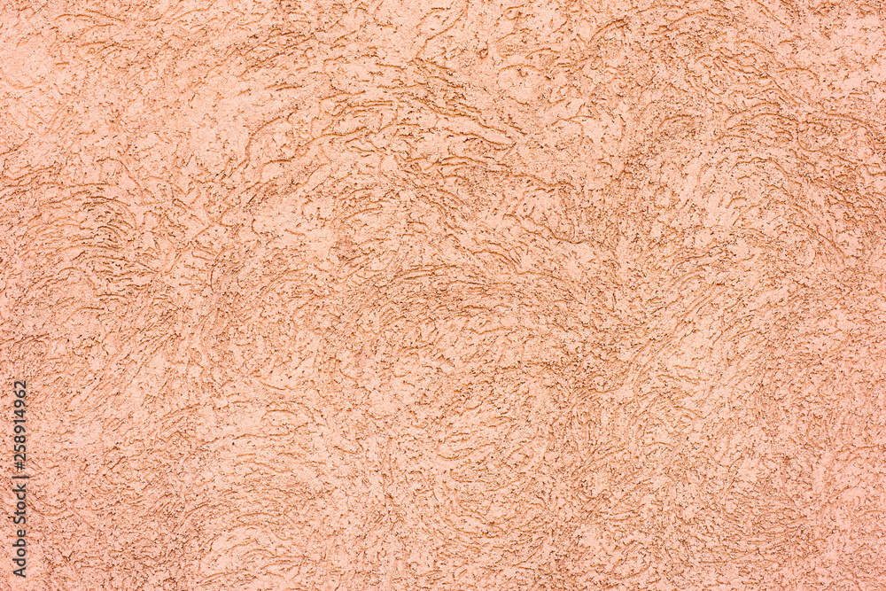 Fototapeta premium Eine rosa Fassaden mit Struktur als Hintergrund