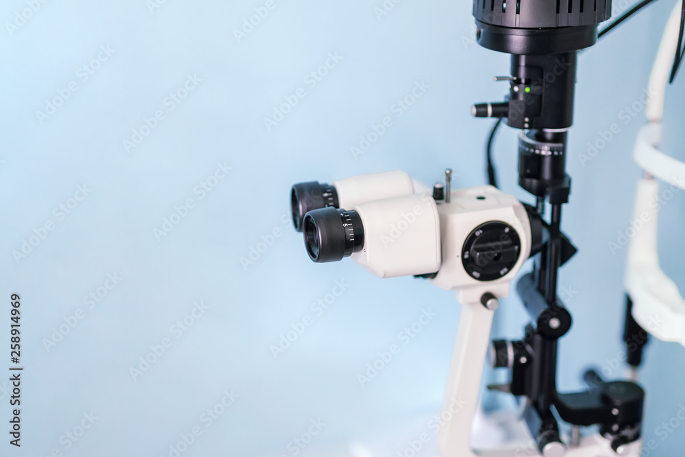 Eyes vision test medical device at ophtalmic clinic. Optometrist office with eyesight check-up equipment. Optician professional tool for person sight examination. Healthcare