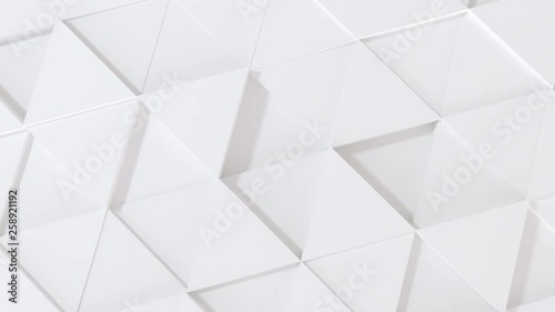Abstract 3d geometric white triangle wall animation.  4k computer rendering footage. loop.