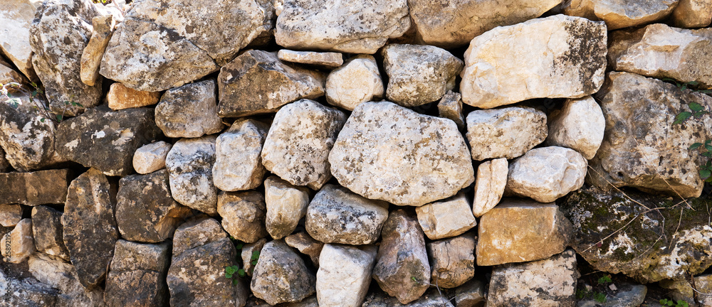 textura de piedras redondas en un muro antiguo textura de piedras redondas en un muro antiguo