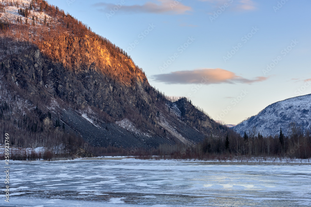 Evening at frozen Siberian river