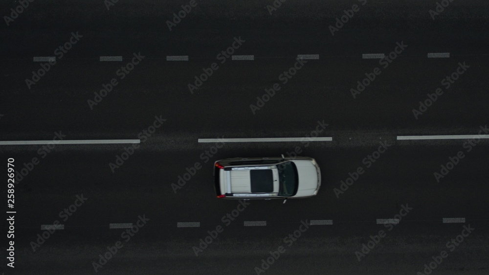 Car on the road. View from above Car on the road. View from above