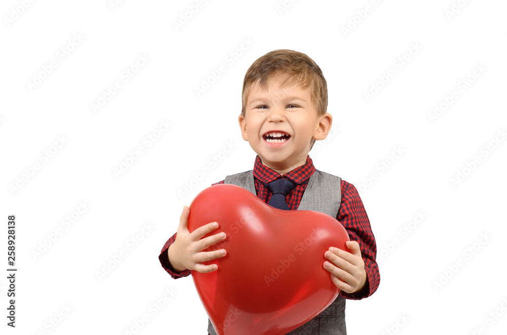 Boy holding a heart shaped balloon Boy holding a heart shaped balloon