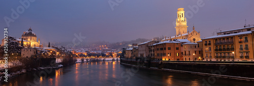 Verona at night with snow - Adige river Italy