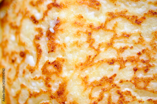 Billede på lærred Cheesecakes are cooked in a frying pan