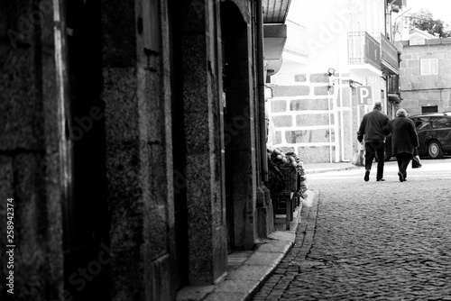 couple walking in street © Carolina