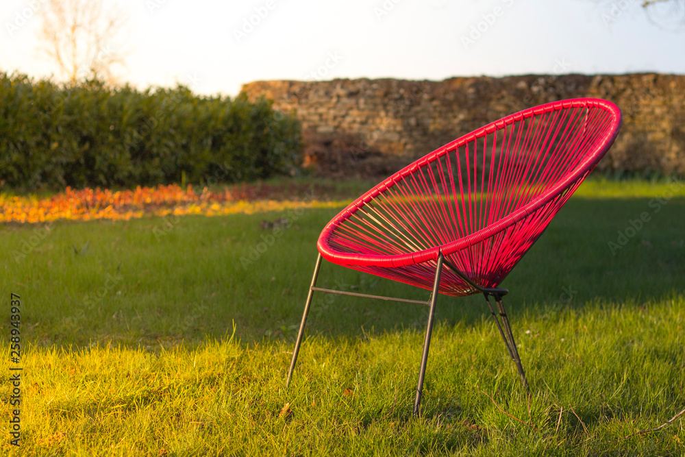 Chaise ou fauteuil acapulco dans un jardin Stock Photo | Adobe Stock