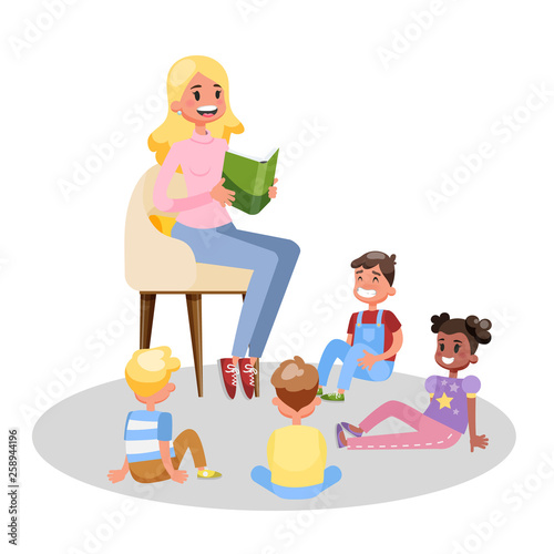 Teacher read book for group of preschool children