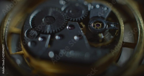 Wallpaper Mural Old clock mechanical part working white lightning from right side mooving backward ProRes 4444 Torontodigital.ca