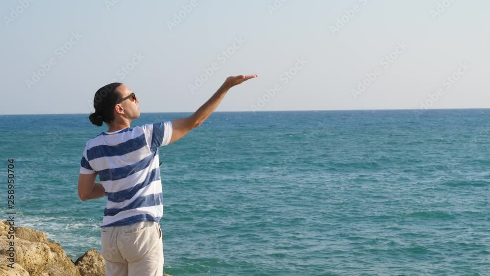 Man launch small aircraft from hand. Little drone liftoff and quickly fly away Man launch small aircraft from hand. Little drone liftoff and quickly fly away