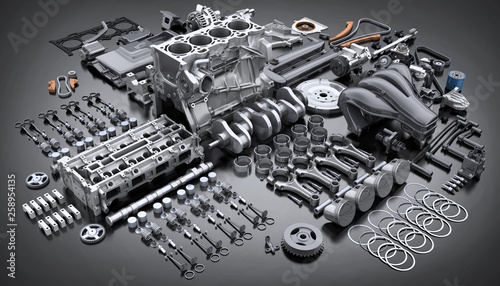 Photo Car engine disassembled. many parts.