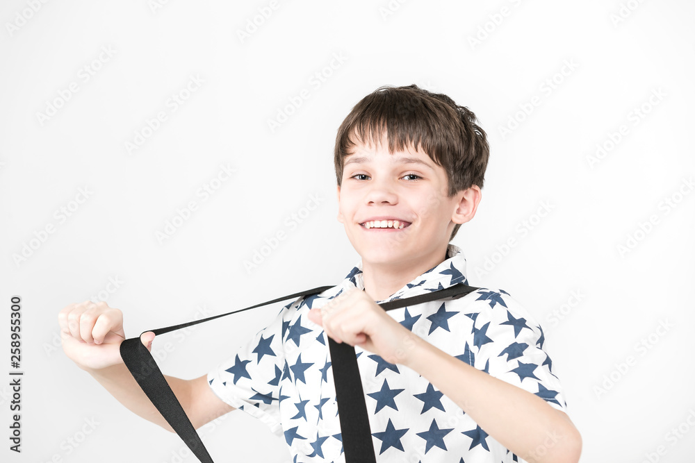 Portrait of an emotional boy on a white background. Portrait of an emotional boy on a white background.
