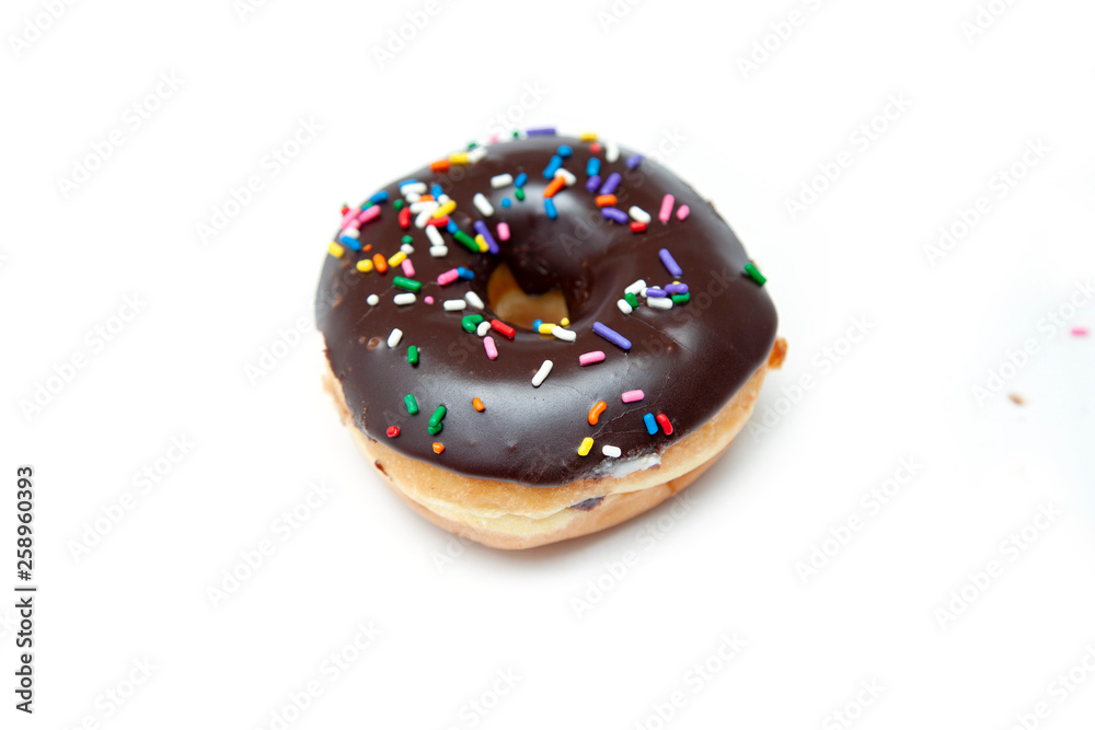 chocolate donuts, candy with colorful sparks chocolate donuts, candy with colorful sparks
