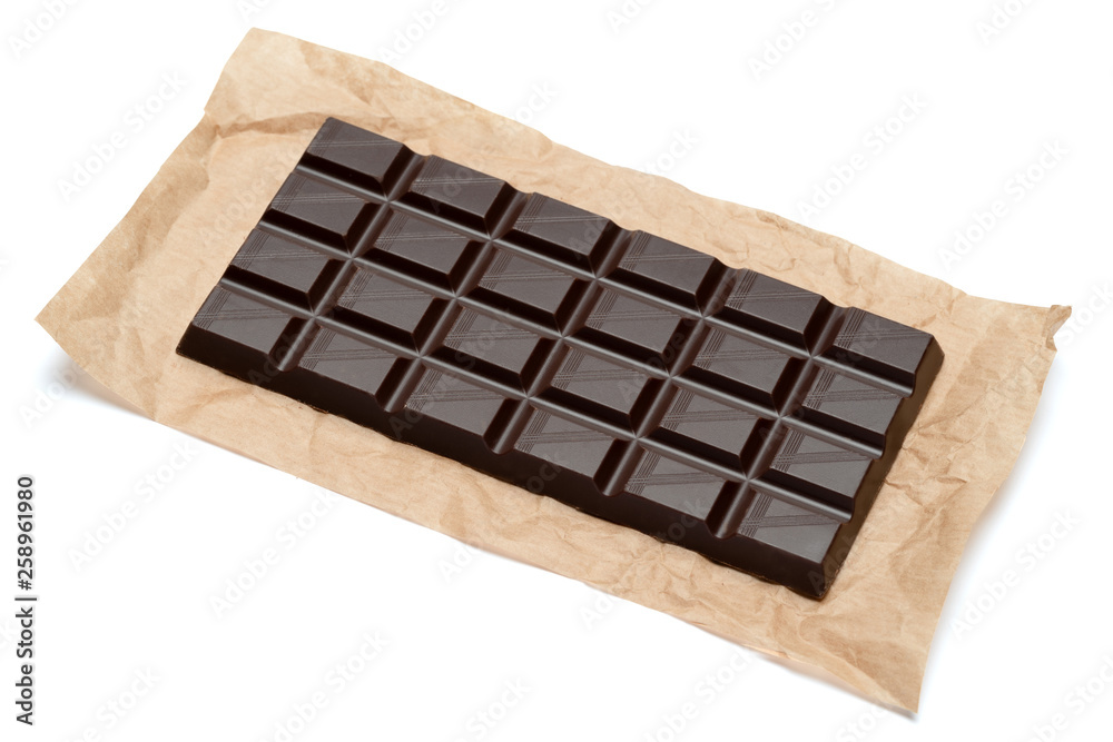 dark chocolate bar on craft packaging paper isolated on white background with clipping path dark chocolate bar on craft packaging paper isolated on white background with clipping path