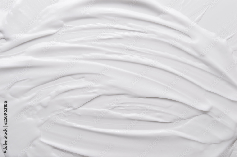 White texture of cosmetic body care cream background White texture of cosmetic body care cream background