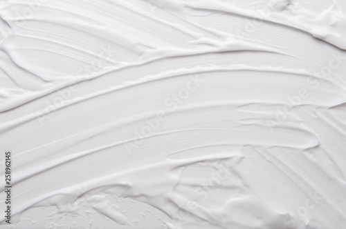 White texture of cosmetic body care cream background