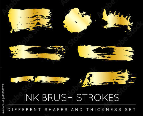 Set of golden paint strokes to make a background for your design, looks like golden hot foil, gold leaf