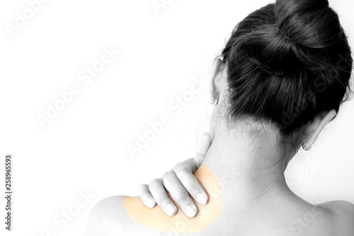 Women have neck pain  shoulder pain  at the park health concept.
