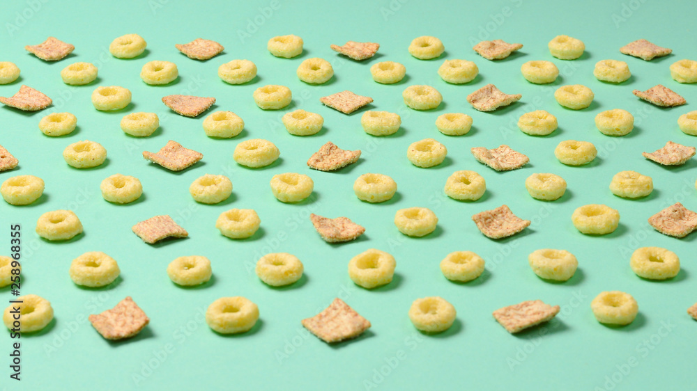 Flakes on a green background. Pattern. Flakes on a green background. Pattern.