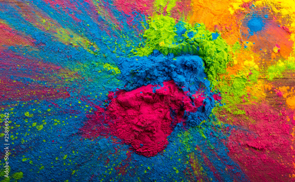 Holi color powder. Organic Gulal colours in bowl for Holi festival