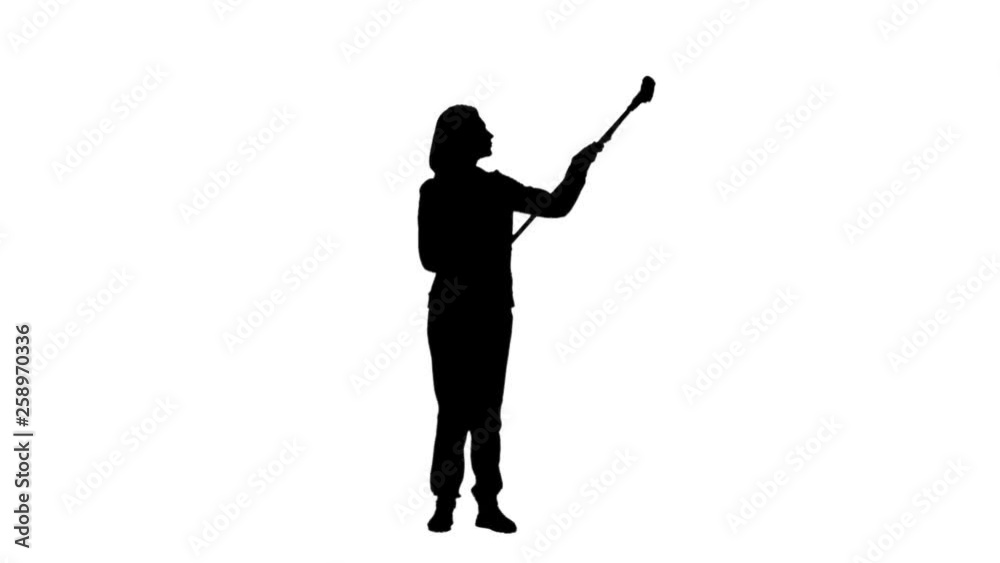 Woman mop washes the wall. Silhouette White background Woman mop washes the wall. Silhouette White background