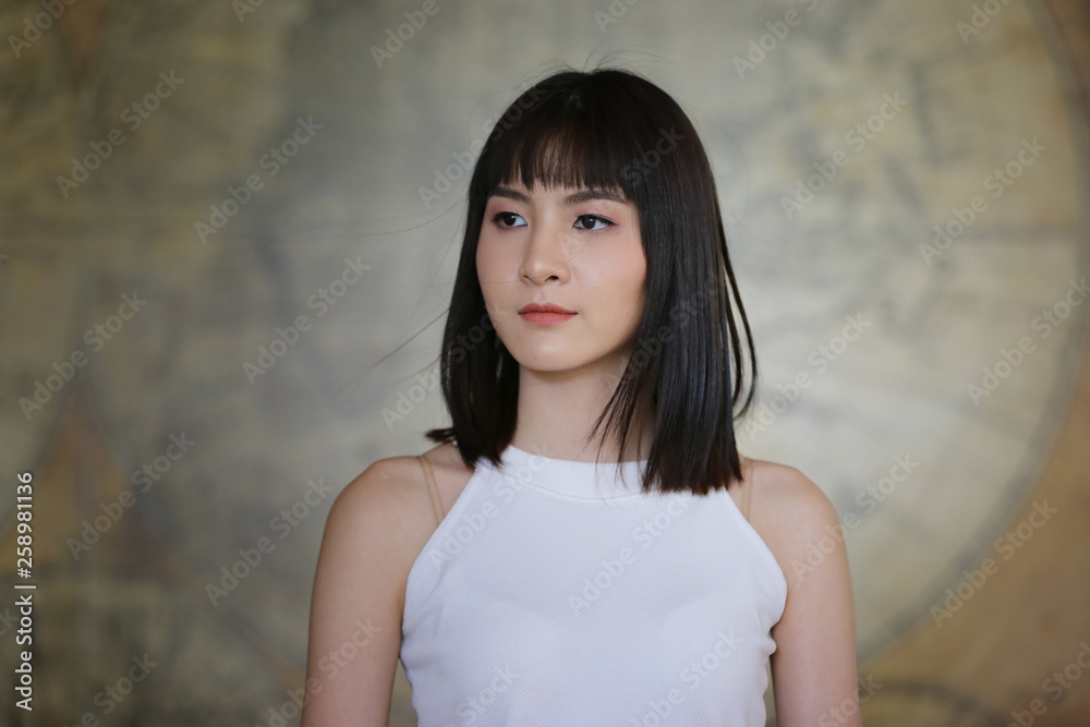 headshot with a beautiful brunette woman sincere happy cheerful positive expression