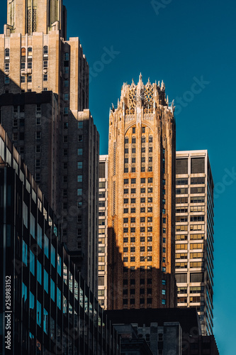 Close-up view of General Electric Building and modern skyscrapers in Midtown Manhattan New York City