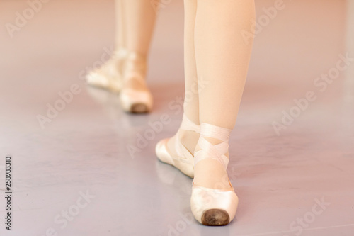 Legs of ballet dancers who is standing