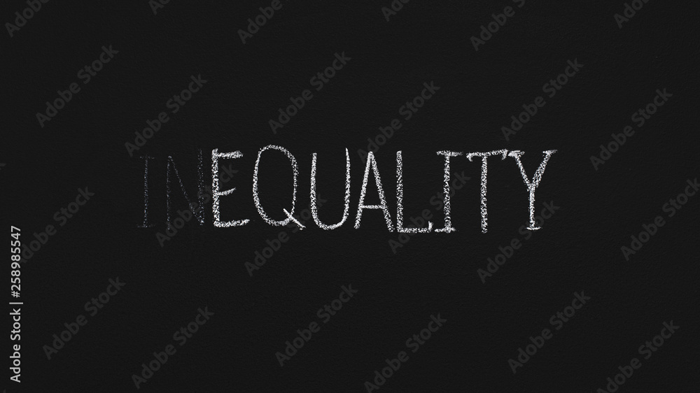 Word Equality written with chalk on blackboard