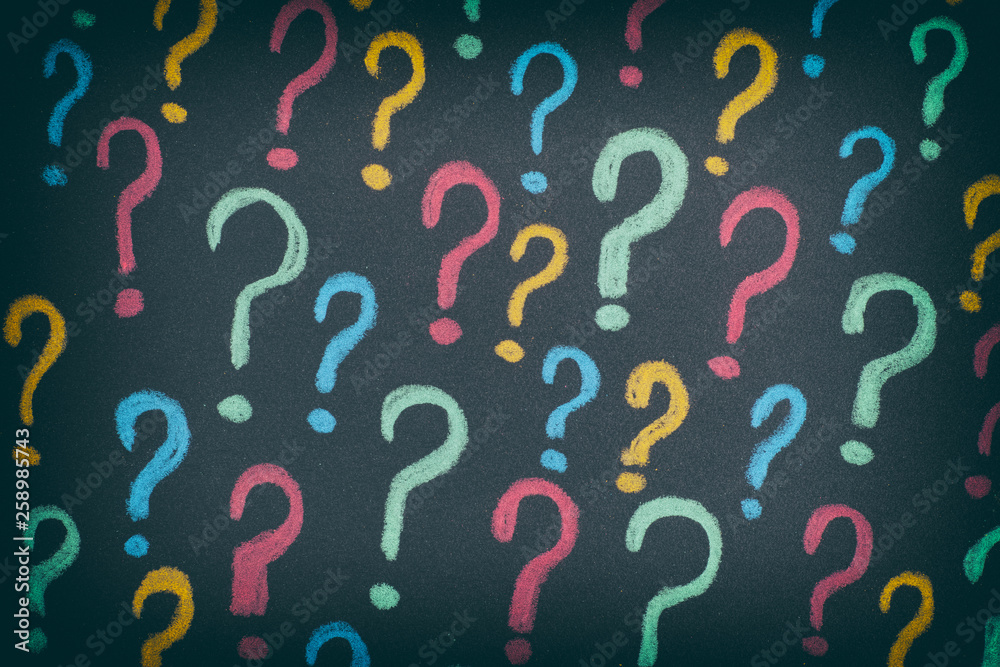 Colorful question marks on a black background Colorful question marks on a black background