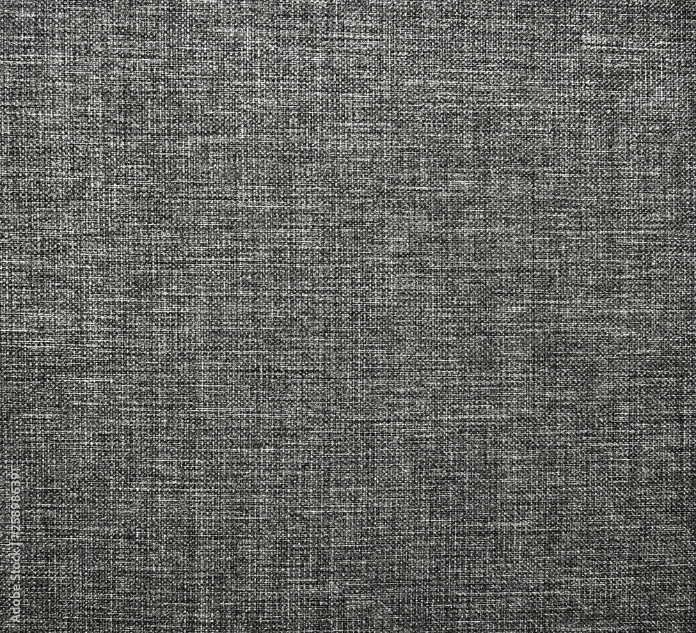 Textured gray natural fabric . Textured gray natural fabric .
