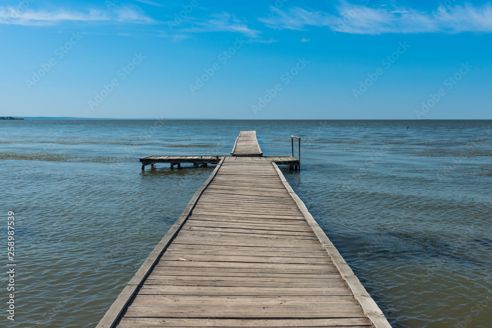 Ukraine, wooden jetty at the Bilhorod-Dnistrovskyi fortress at the Black Sea coast Ukraine, wooden jetty at the Bilhorod-Dnistrovskyi fortress at the Black Sea coast