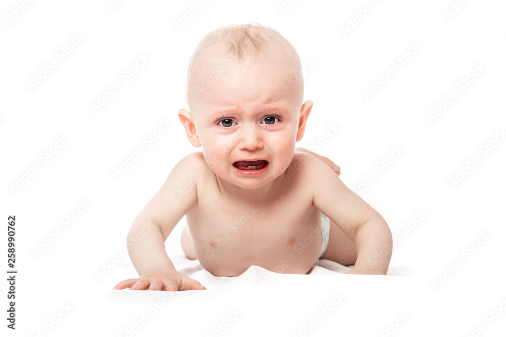 Crying baby boy isolated on white. Close up picture of boy having a melt down moment and full of emotions Crying baby boy isolated on white. Close up picture of boy having a melt down moment and full of emotions