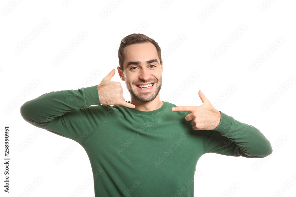 Man showing CALL ME gesture in sign language on white background Man showing CALL ME gesture in sign language on white background