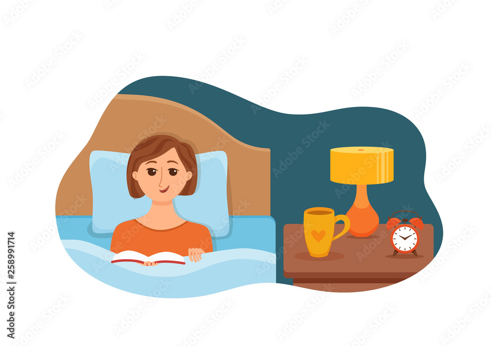 Fototapeta premium Girl lying on bed in home bedroom and reading a book