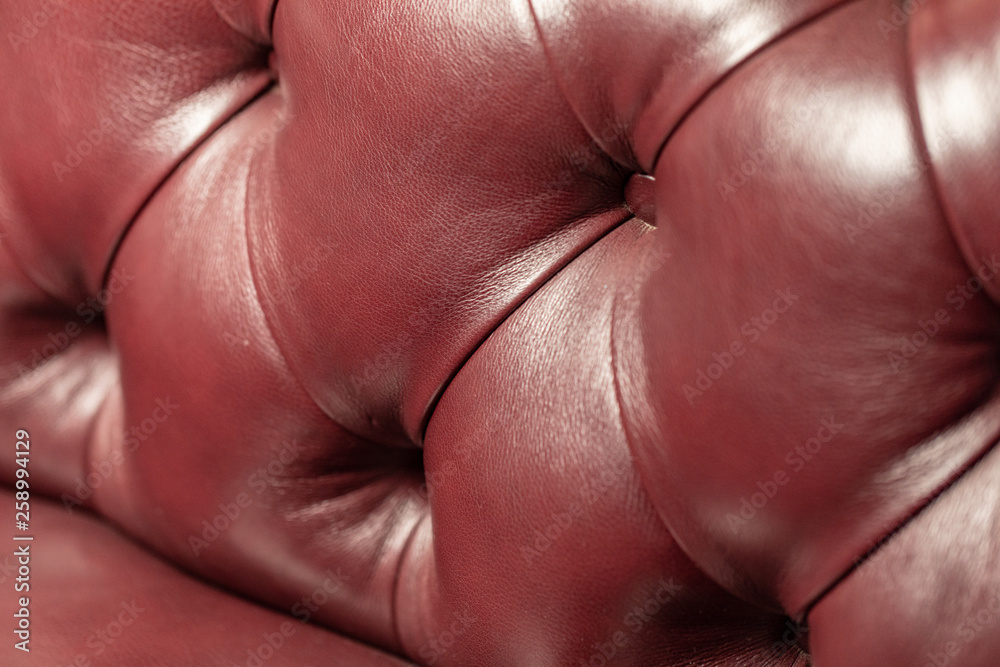 Fototapeta premium Buttoned on the red Texture. Repeat pattern