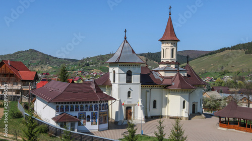 Monastery in Mănăstirea Humorului, Bucovina region. Romania photo