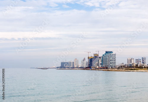 Tel Aviv  Israel. View of the Tel Aviv promenade with modern skyscrapers along the seacoast.