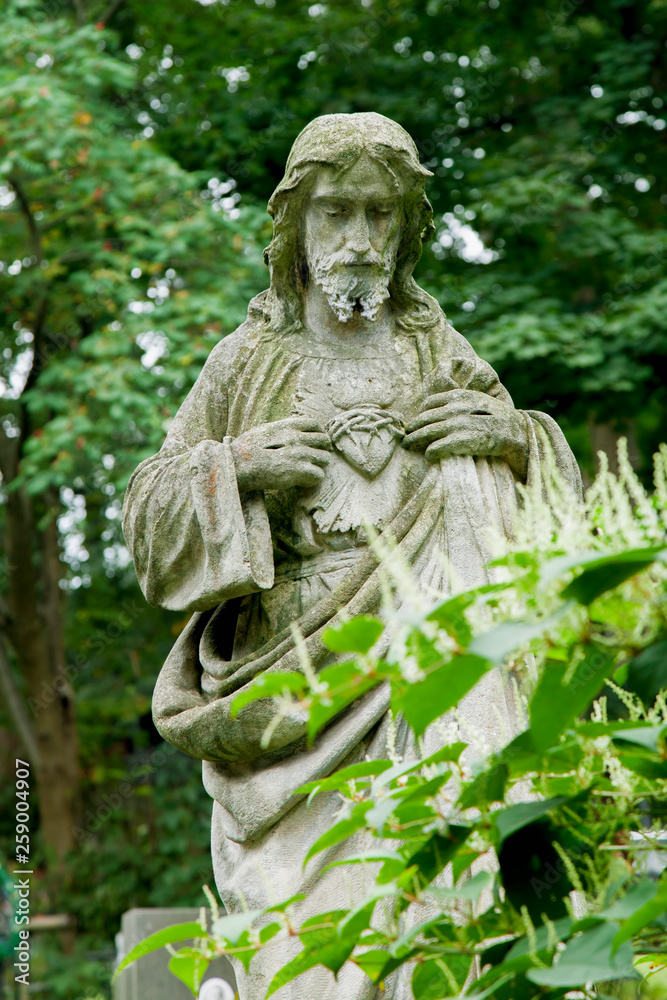 Ancient statue of Jesus Christ. Religion tradition.