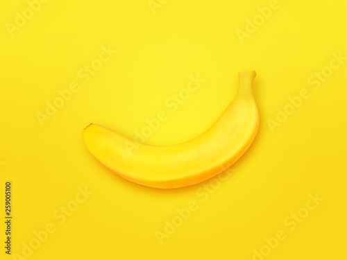 Ripe yellow banana on color background