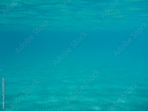 Underwater view of the beautiful Skala beach of Kefalonia island, Ionian sea, Greece.