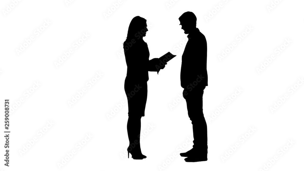Boss tells her employee about the work showing him the documents . White background. Side view. Silhouette Boss tells her employee about the work showing him the documents . White background. Side view. Silhouette