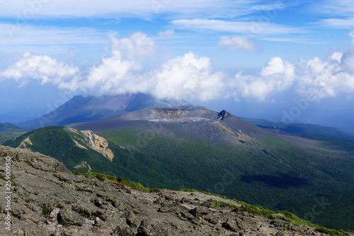 Shinmoe-dake and Takachiho-no-mine volcano ridge seen from Karakuni-dake, Ebino kogen, Japan