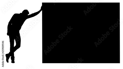 Tired guy leaned against the wall. White background. Silhouette