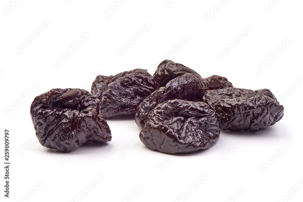 Fresh dry prunes, Dried sweet plums, close-up, isolated on white background Fresh dry prunes, Dried sweet plums, close-up, isolated on white background