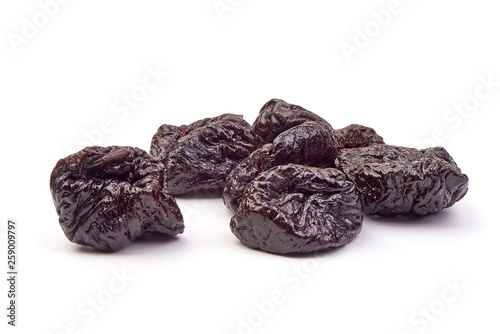 Fresh dry prunes, Dried sweet plums, close-up, isolated on white background