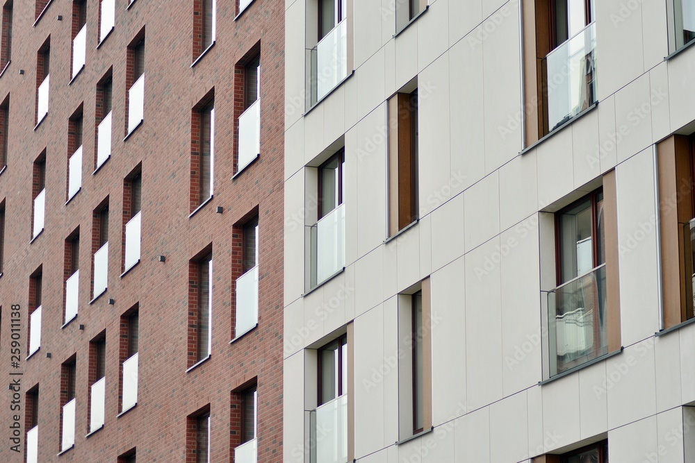Fragment of a modern apartment building in front. Very modern apartment house. Fragment of a modern apartment building in front. Very modern apartment house.